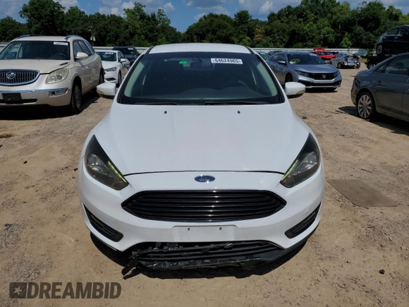 2017 Ford Focus SE with VIN 1FADP3FE9HL348123, listed as a Copart auction lot 64624965 with 58,650 mi miles and Clean title. Bid and sale history available at DreamBid. Image 5.