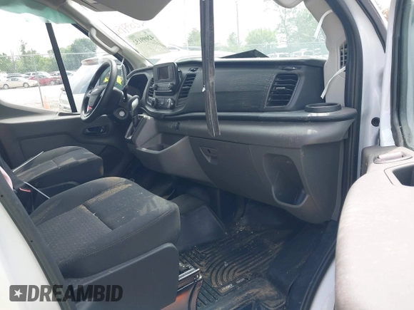 2023 Ford Transit Cargo с VIN 1FTBR2C84PKB85423, выставлен на аукционе IAAI как лот 42099152 с пробегом 48 328 миль миль и . История ставок и продаж доступна на DreamBid. Изображение 5.