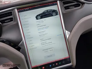 2015 Tesla Model S 85D with VIN 5YJSA1E25FF107819, listed as a IAAI auction lot 41333556 with 141,066 mi miles. Bid and sale history available at carsss.com. Image 18.