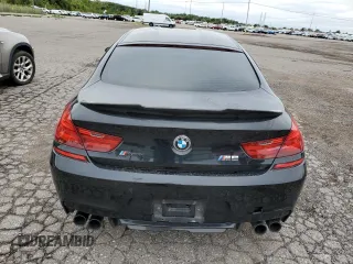 2015 BMW M6 z VIN WBS6C9C59FD467652, wystawiony jako Copart lot #66093293 z przebiegiem Nie podano mil oraz . Historia ofert i sprzedaży dostępna na DreamBid. Obrazek 6.