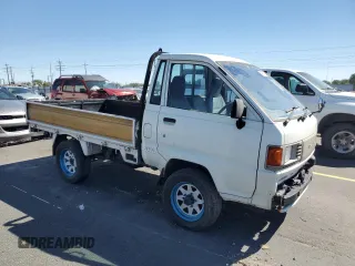 1994 Toyota Tacoma with VIN CM600012981, listed as a Copart auction lot 64052155 with 237,536 mi miles and Salvage title. Bid and sale history available at DreamBid. Image 4.