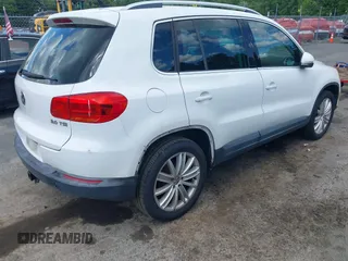 2012 Volkswagen Tiguan S with VIN WVGAV7AX0CW566151, listed as a IAAI auction lot 42826985 with 121,185 mi miles and . Bid and sale history available at DreamBid. Image 4.
