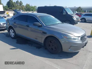 2014 Ford Police Interceptor z VIN 1FAHP2MKXEG170442, wystawiony jako IAAI lot #42424810 z przebiegiem 107 896 mil mil oraz . Historia ofert i sprzedaży dostępna na DreamBid. Obrazek 1.