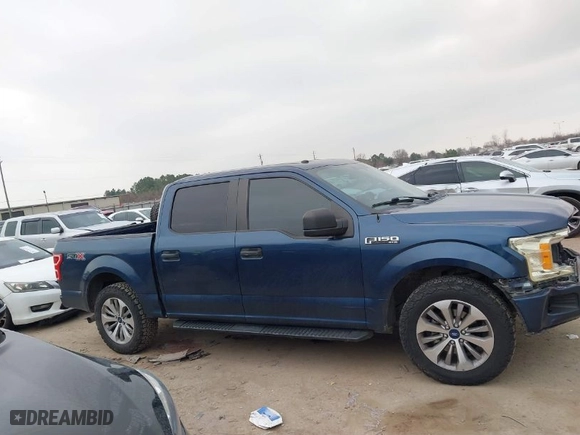 2018 Ford F-150 XL with VIN 1FTEW1CP2JFC00220, listed as a IAAI auction lot 41557424 with 263,032 mi miles. Bid and sale history available at carsss.com. Image 14.