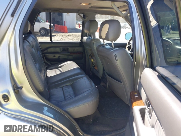 2000 Infiniti QX4 with VIN JNRAR07Y5YW081382, listed as a IAAI auction lot 41854640 with 147,173 mi miles and . Bid and sale history available at DreamBid. Image 8.