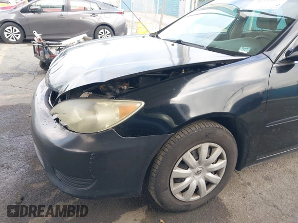 2006 Toyota Camry STD with VIN 4T1BE32K16U165708, listed as a IAAI auction lot 42138137 with 156,438 mi miles and . Bid and sale history available at DreamBid. Image 19.