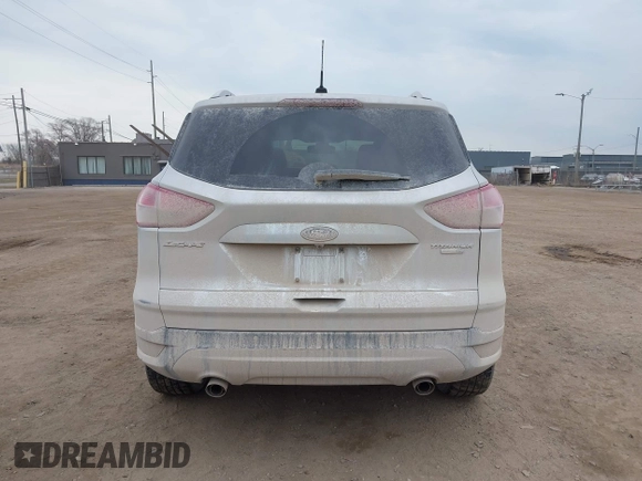 2015 Ford Escape Titanium with VIN 1FMCU9J92FUA60166, listed as a IAAI auction lot 41914080 with 103,122 mi miles and . Bid and sale history available at DreamBid. Image 16.
