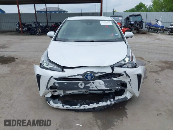2022 Toyota Prius L Eco with VIN JTDKAMFUXN3157225, listed as a IAAI auction lot 39292379 with 59,333 mi miles and . Bid and sale history available at DreamBid. Image 6.