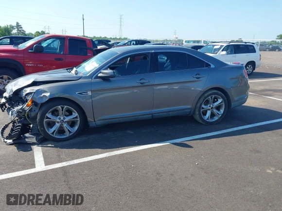 2011 Ford Taurus SHO with VIN 1FAHP2KT4BG129439, listed as a IAAI auction lot 42495871 with 164,841 mi miles and . Bid and sale history available at DreamBid. Image 2.