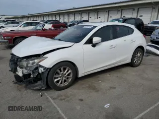 2014 Mazda 3 i Grand Touring z VIN JM1BM1M70E1213784, wystawiony jako Copart lot #54356035 z przebiegiem 135 060 mil mil oraz Szkoda całkowita • Salvage title. Historia ofert i sprzedaży dostępna na DreamBid. Obrazek 1.