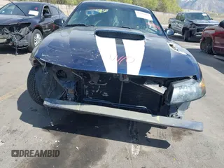 2002 Ford Mustang GT Deluxe z VIN 1FAFP42X12F191957, wystawiony jako IAAI lot #42021857 z przebiegiem Nie podano mil oraz . Historia ofert i sprzedaży dostępna na DreamBid. Obrazek 6.