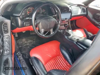 2002 Chevrolet Corvette Z06 z VIN 1G1YY12S925103478, wystawiony jako Copart lot #52198395 z przebiegiem 65 027 mil mil oraz Szkody całkowita. Historia ofert i sprzedaży dostępna na DreamBid. Obrazek 8.
