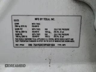2023 Tesla Model Y Long Range z VIN 7SAYGDEE9PA081604, wystawiony jako Copart lot #60163785 z przebiegiem 42 134 mil mil oraz Szkoda całkowita • Salvage title. Historia ofert i sprzedaży dostępna na DreamBid. Obrazek 13.