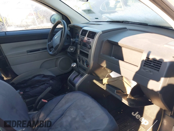 2007 Jeep Compass Sport with VIN 1J8FF47W47D396942, listed as a IAAI auction lot 41403901 with 999,999 mi miles. Bid and sale history available at carsss.com. Image 5.