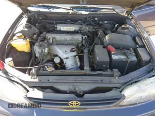 1996 Toyota Camry DX with VIN 4T1BG12K8TU915891, listed as a IAAI auction lot 41874731 with 57,564 mi miles. Bid and sale history available at carsss.com. Image 10.