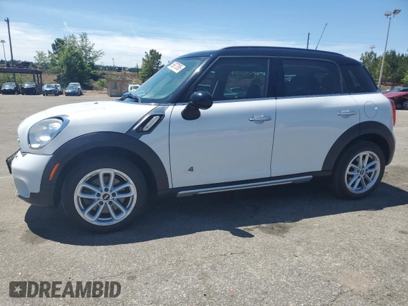 2016 MINI Countryman S with VIN WMWZC5C51GWU00690, listed as a Copart auction lot 55077095 with 104,176 mi miles and Salvage title. Bid and sale history available at DreamBid. Image 1.
