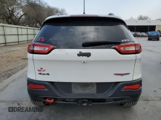 2014 Jeep Cherokee Trailhawk with VIN 1C4PJMBS3EW294676, listed as a Copart auction lot 47652335 with 161,663 mi miles and Salvage Title. Bid and sale history available at carsss.com. Image 6.
