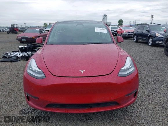 2023 Tesla Model Y Long Range with VIN 7SAYGDEE9PA145947, listed as a IAAI auction lot 42131783 with 4,956 mi miles and . Bid and sale history available at DreamBid. Image 13.