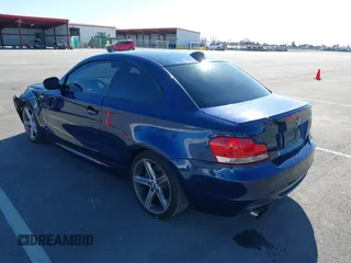 2010 BMW 1 Series 135i with VIN WBAUC7C58AVK96377, listed as a IAAI auction lot 41666512 with 136,890 mi miles and . Bid and sale history available at carsss.com. Image 3.