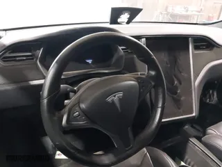 2016 Tesla Model S 90D with VIN 5YJSA1E2XGF171288, listed as a IAAI auction lot 41766075 with 112,927 mi miles. Bid and sale history available at carsss.com. Image 16.