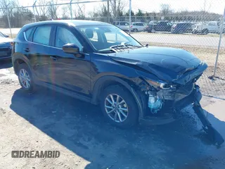 2023 Mazda CX-5 2.5 S with VIN JM3KFBAM9P0194078, listed as a IAAI auction lot 41579370 with 39,260 mi miles. Bid and sale history available at carsss.com. Image 1.