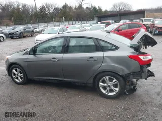 2014 Ford Focus SE with VIN 1FADP3F22EL110079, listed as a IAAI auction lot 41461344 with 201,230 mi miles. Bid and sale history available at carsss.com. Image 14.