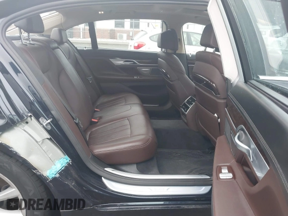 2019 BMW 7 Series 740i xDrive with VIN WBA7E4C52KGV70359, listed as a IAAI auction lot 41421504 with 55,734 mi miles and . Bid and sale history available at carsss.com. Image 8.
