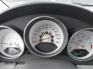 2007 Dodge Caliber SXT with VIN 1B3HB48C57D167476, listed as a IAAI auction lot 41676564 with 239,597 mi miles and . Bid and sale history available at DreamBid. Image 7.