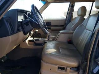 2000 Jeep Cherokee Limited with VIN 1J4FF68S0YL250926, listed as a Copart auction lot 84837244 with 141,020 mi miles and Salvage Title. Bid and sale history available at carsss.com. Image 7.