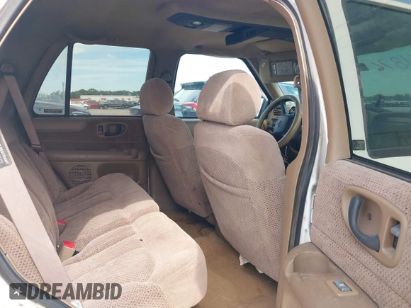 1999 Chevrolet Blazer Trailblazer z VIN 1GNDT13W4X2208791, wystawiony jako IAAI lot #42281876 z przebiegiem 261 605 mil mil oraz . Historia ofert i sprzedaży dostępna na DreamBid. Obrazek 8.