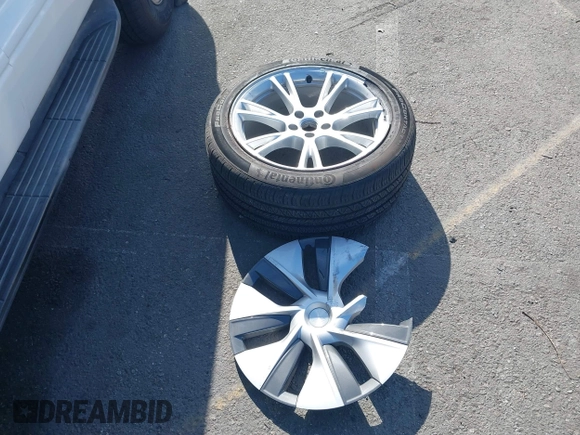 2023 Tesla Model Y Long Range with VIN 7SAYGDEE9PA094191, listed as a IAAI auction lot 41906319 with 15,240 mi miles and . Bid and sale history available at DreamBid. Image 12.