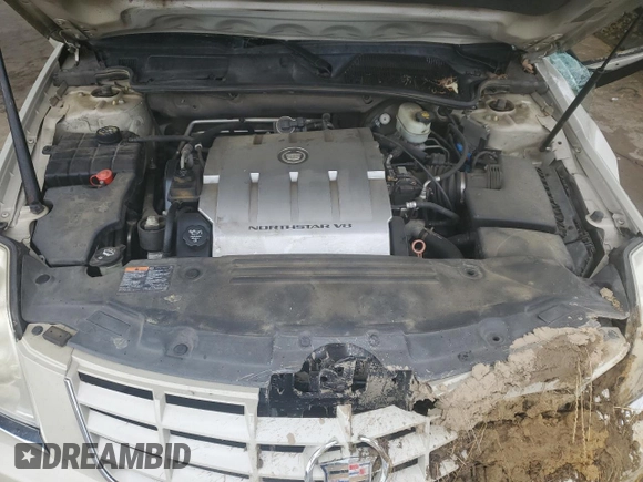 2011 Cadillac DTS Premium Collection z VIN 1G6KH5E61BU125972, wystawiony jako Copart lot #58870355 z przebiegiem 120 373 mil mil oraz Szkoda całkowita • Salvage title. Historia ofert i sprzedaży dostępna na DreamBid. Obrazek 11.