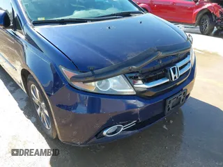 2016 Honda Odyssey Touring Elite with VIN 5FNRL5H98GB083221, listed as a IAAI auction lot 41626604 with 145,341 mi miles and . Bid and sale history available at DreamBid. Image 19.
