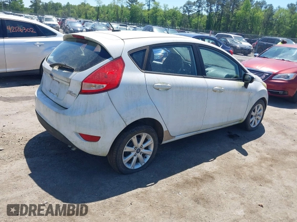 2013 Ford Fiesta SE with VIN 3FADP4EJ0DM109816, listed as a IAAI auction lot 42119360 with 164,397 mi miles and . Bid and sale history available at DreamBid. Image 4.