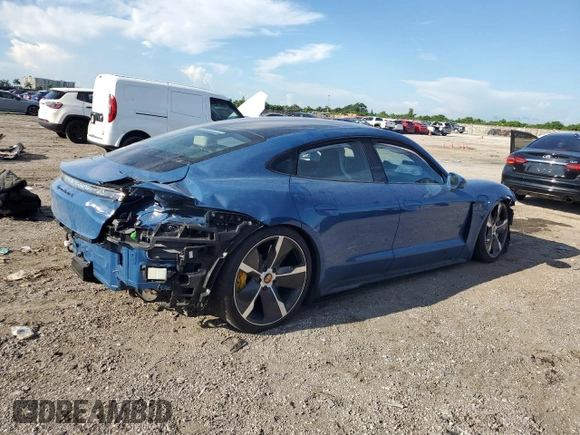 2021 Porsche Taycan Turbo z VIN WP0AC2Y12MSA63960, wystawiony jako Copart lot #71588534 z przebiegiem Nie podano mil oraz Szkoda całkowita • Salvage title. Historia ofert i sprzedaży dostępna na DreamBid. Obrazek 3.