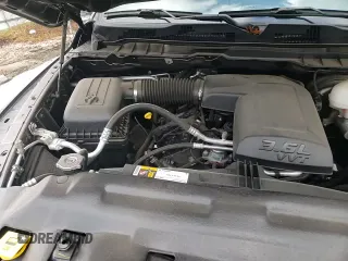 2023 Ram 1500 SLT with VIN 1C6RR7GG0PS556467, listed as a Copart auction lot 83797344 with 7,653 mi miles and Salvage title. Bid and sale history available at DreamBid. Image 14.