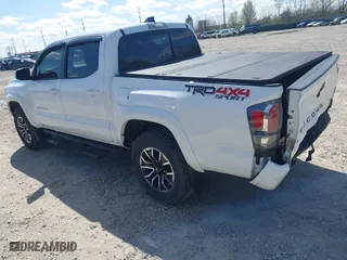 2023 Toyota Tacoma 4WD SR with VIN 3TMCZ5AN8PM647523, listed as a IAAI auction lot 41887896 with 17,864 mi miles. Bid and sale history available at carsss.com. Image 3.