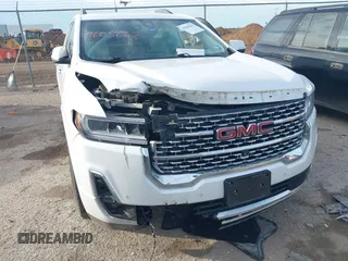 2020 GMC Acadia Denali with VIN 1GKKNXLS8LZ121704, listed as a IAAI auction lot 41665662 with 69,937 mi miles. Bid and sale history available at carsss.com. Image 6.