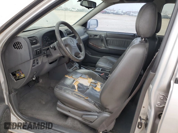 2000 Isuzu Rodeo S with VIN 4S2CK58W8Y4351180, listed as a Copart auction lot 44648595 with 375,829 mi miles and Salvage title. Bid and sale history available at DreamBid. Image 7.