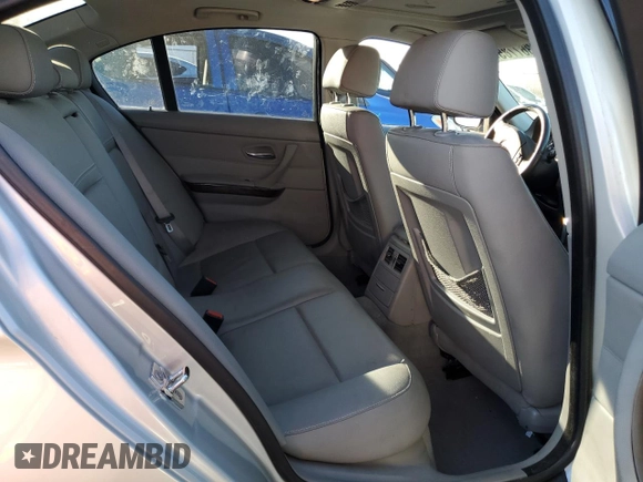 2009 BMW 3 Series 328i with VIN WBAPH73589E128233, listed as a Copart auction lot 88367785 with 63,142 mi miles and Salvage title. Bid and sale history available at DreamBid. Image 10.