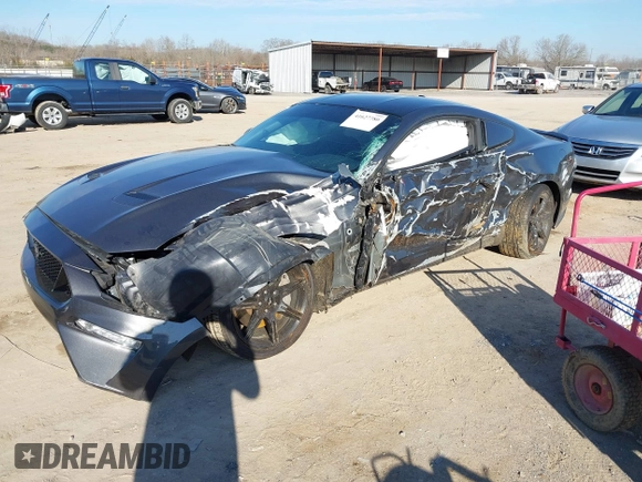 2018 Ford Mustang GT z VIN 1FA6P8CF4J5158775, wystawiony jako IAAI lot #41627780 z przebiegiem 65 519 mil mil oraz . Historia ofert i sprzedaży dostępna na DreamBid. Obrazek 6.
