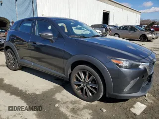 2017 Mazda CX-3 Touring with VIN JM1DKFC71H0159435, listed as a Copart auction lot 47443125 with 104,025 mi miles and Clean Title. Bid and sale history available at DreamBid. Image 4.