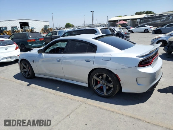 2019 Dodge Charger SRT Hellcat with VIN 2C3CDXL96KH588025, listed as a Copart auction lot 64705614 with 49,659 mi miles and Salvage Title. Bid and sale history available at DreamBid. Image 2.