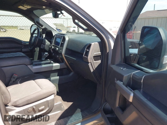 2020 Ford F-150 XL with VIN 1FTEW1E57LKE71523, listed as a IAAI auction lot 42265118 with 83,788 mi miles and . Bid and sale history available at DreamBid. Image 5.