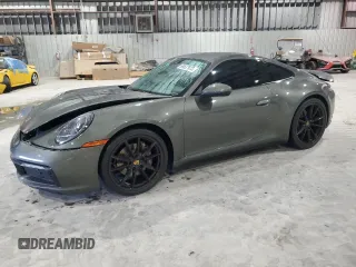 2021 Porsche 911 Carrera with VIN WP0AA2A92MS206733, listed as a Copart auction lot 66537973 with 27,966 mi miles. Bid and sale history available at carsss.com. Image 1.