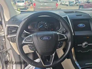 2020 Ford Edge Titanium z VIN 2FMPK3K97LBB37876, wystawiony jako IAAI lot #42468230 z przebiegiem 80 404 mil mil oraz . Historia ofert i sprzedaży dostępna na DreamBid. Obrazek 1.