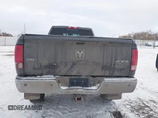 2014 Ram 2500 SLT with VIN 3C6TR5JT5EG203839, listed as a IAAI auction lot 41277795 with 135,344 mi miles and . Bid and sale history available at DreamBid. Image 16.