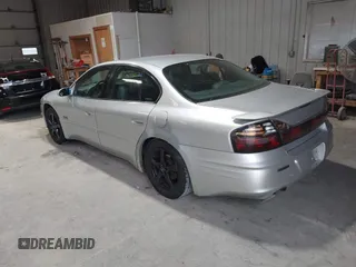 2000 Pontiac Bonneville SLE z VIN 1G2HY54K8Y4266136, wystawiony jako IAAI lot #37856460 z przebiegiem 190 979 mil mil oraz . Historia ofert i sprzedaży dostępna na DreamBid. Obrazek 3.