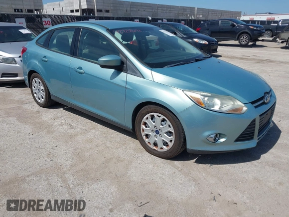 2012 Ford Focus SE z VIN 1FAHP3F22CL352952, wystawiony jako IAAI lot #42722671 z przebiegiem 126 923 mil mil oraz . Historia ofert i sprzedaży dostępna na DreamBid. Obrazek 1.