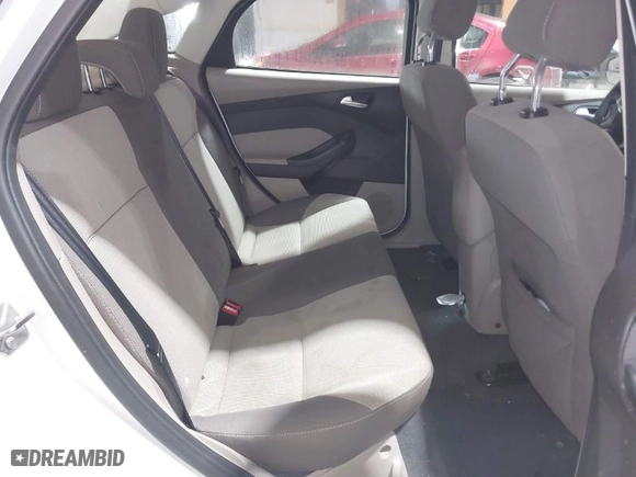 2012 Ford Focus SE with VIN 1FAHP3F24CL313957, listed as a IAAI auction lot 41368553 with 113,610 mi miles. Bid and sale history available at carsss.com. Image 8.